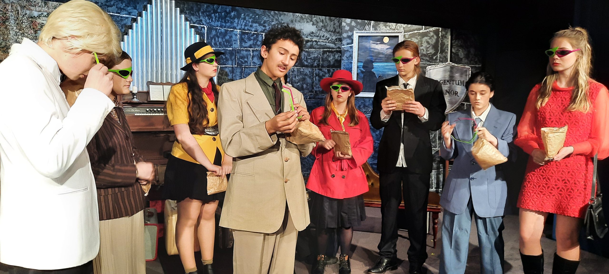 Student performers dressed in character for school production